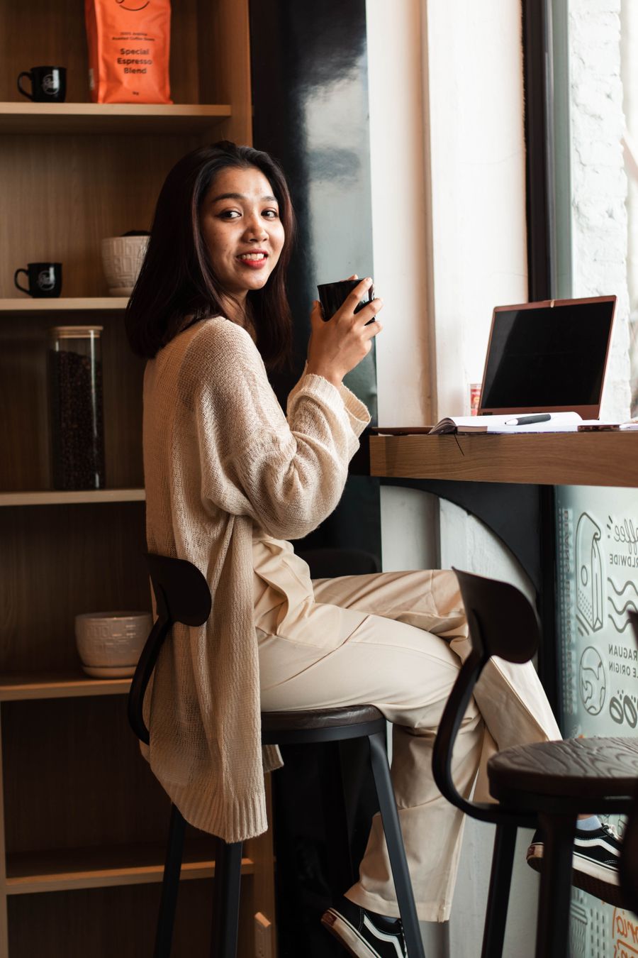 a woman holding a coffee — eSIM Installation Guide: the fastest way to turn a vague travel question into a next step.