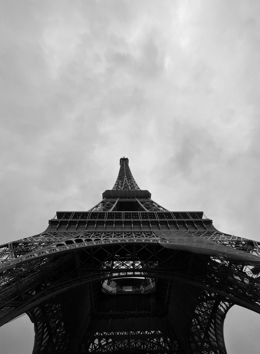 low angle shot of eiffel tower — Market mornings: look up the dish, translate the menu, pay by phone.
