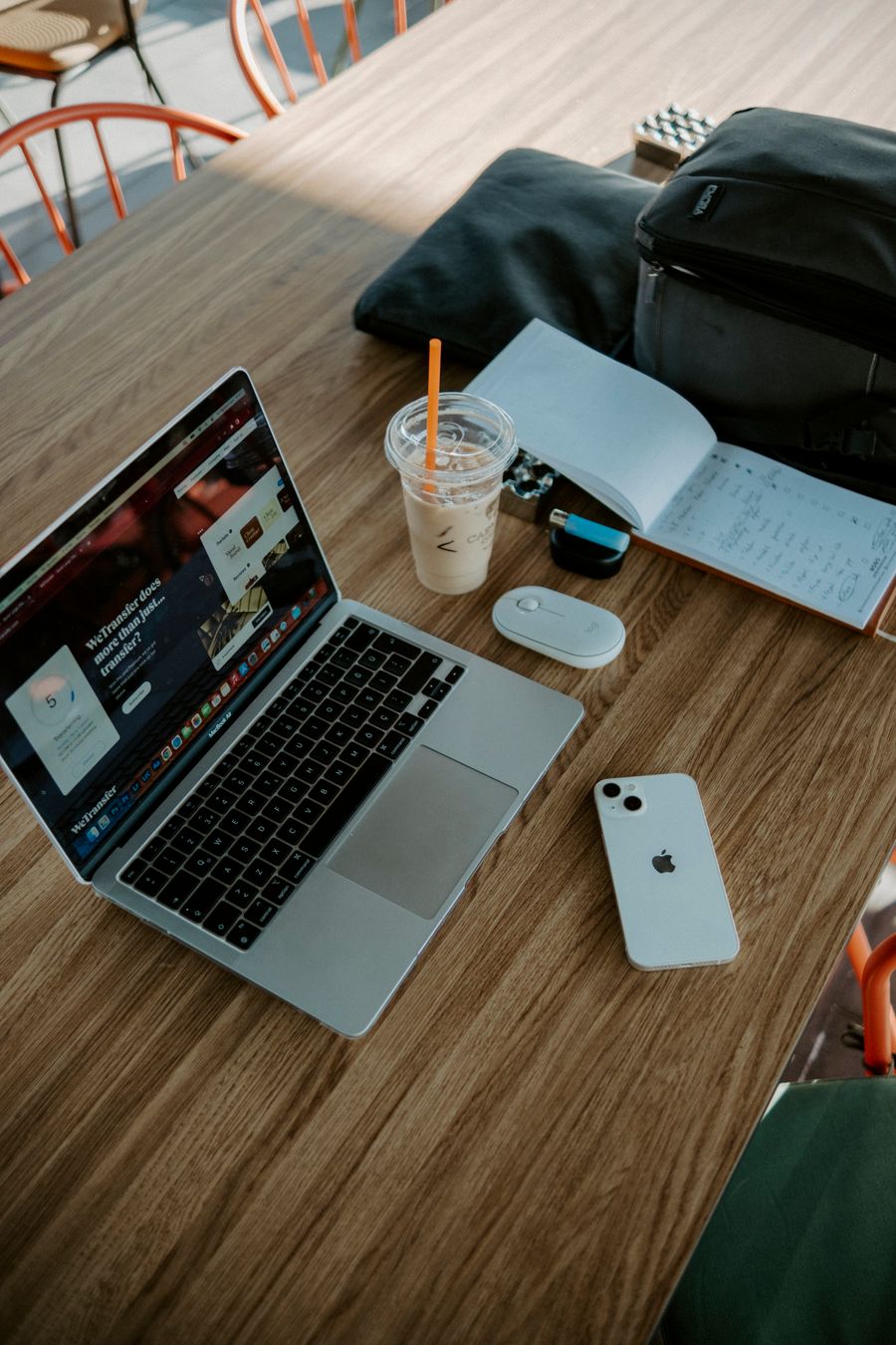 mobile office in cafe — Real journeys, real connectivity — this is what the product is for.