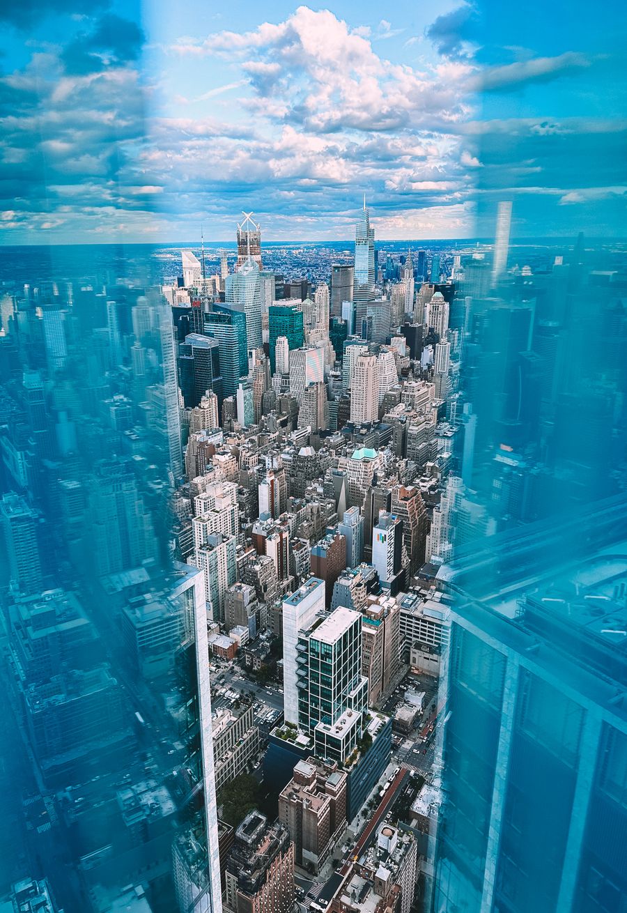 aerial view of skyscrapers in new york city new york usa — The modern arrival: online before the seatbelt sign goes off.