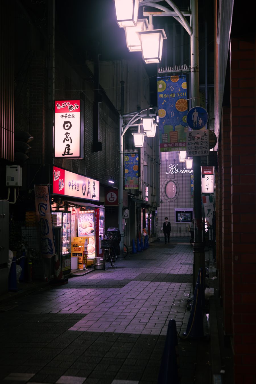 narrow alley in city at night — Rain or shine, the connection holds — weather doesn't throttle data.