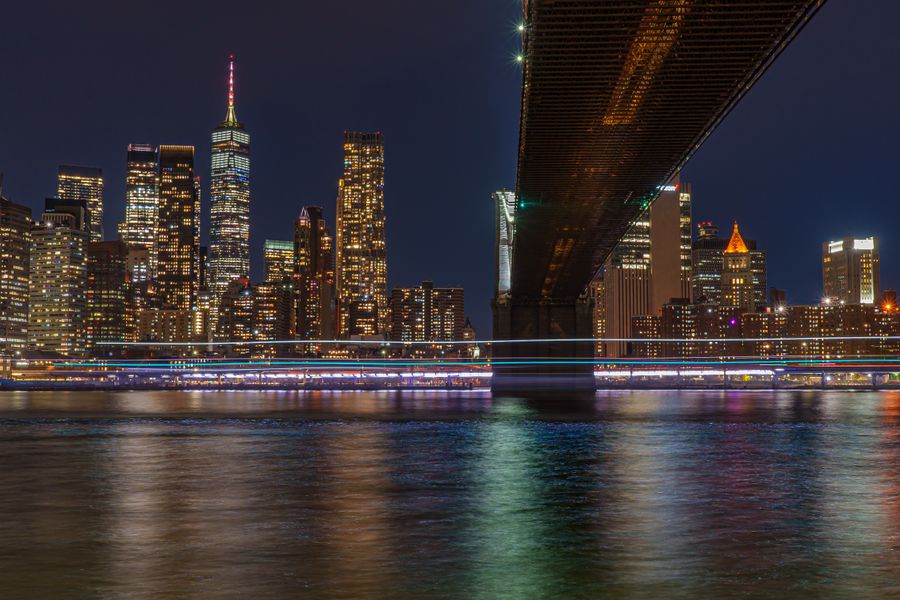 stunning new york city night skyline with bridge