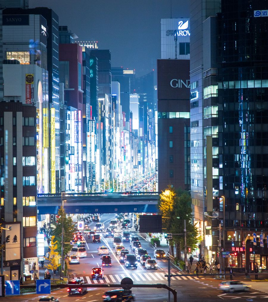 cars on road in city during night time