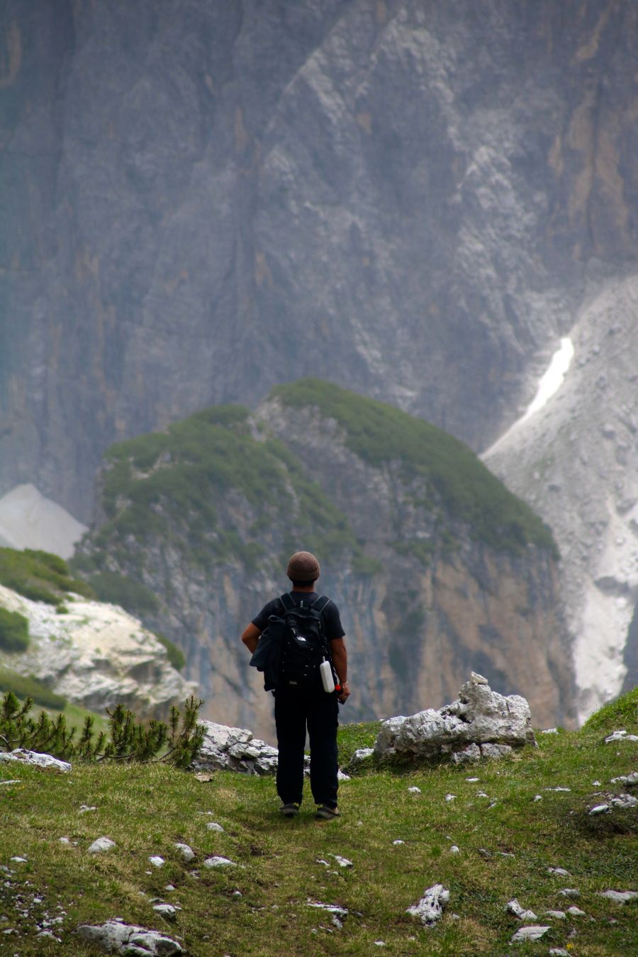 lone hiker exploring dolomite mountains landscape — The commute, handled: podcasts downloaded, messages sent, no dead zones.
