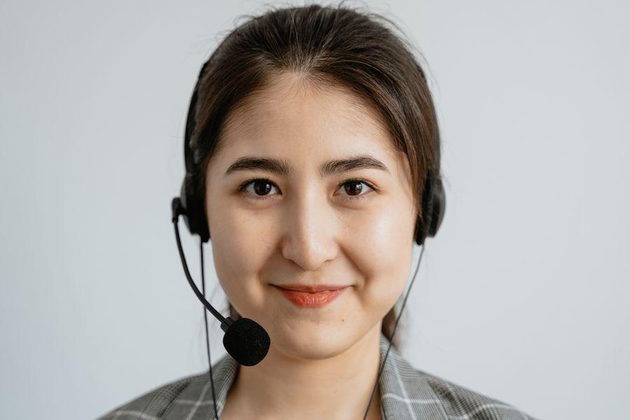 a portrait of a woman wearing a headset