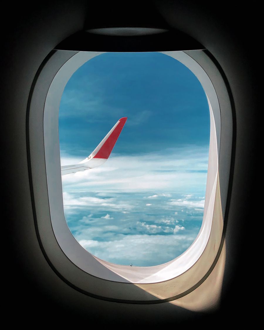 a view of the sky from an airplane window — O tour gastronômico de Brazil: cada recomendação checada na hora.