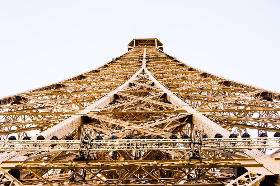 eiffel tower in worm hole view — The business trip: client deck synced, video call joined from the taxi.