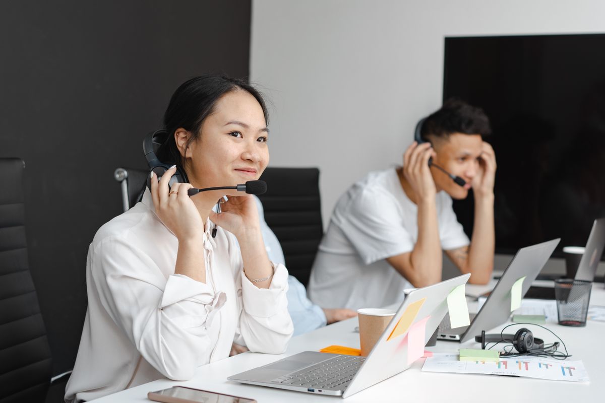 Support specialists with headsets